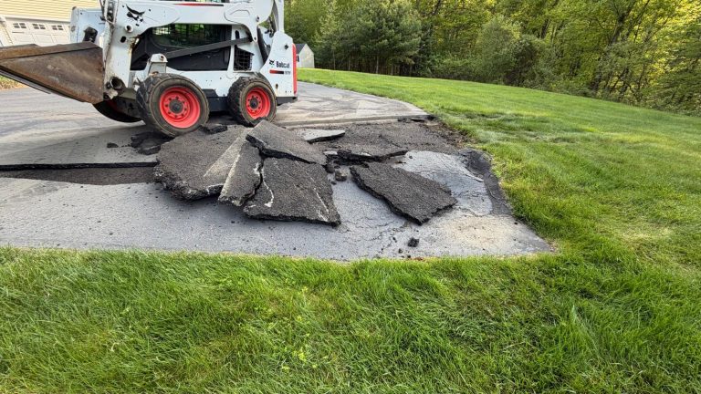 Removing asphalt to repair Pothole in Bolton, MA