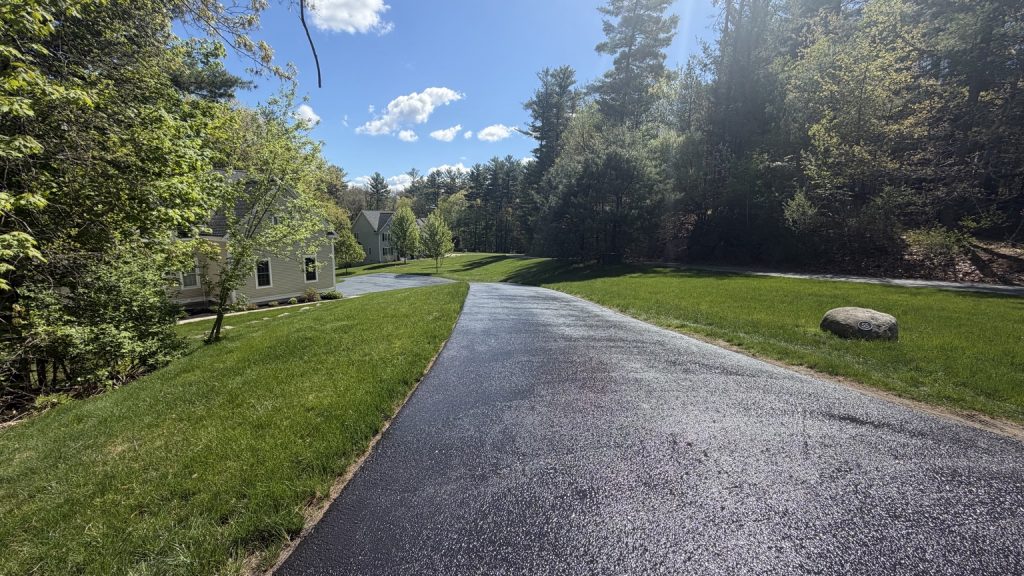 Littleton MA driveway after sealcoating and crack filling