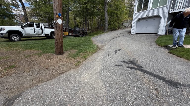 Lunenburg MA driveway before crack filling and sealcoating