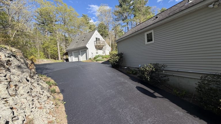 Lunenburg MA freshly sealed driveway with lakefront view